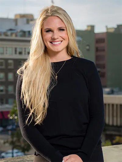 Studio Flo Pilates Instructor Kaitlyn Bradley in a black outfit