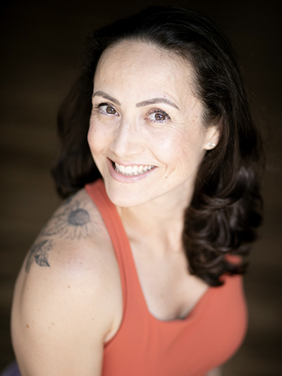 Studio Flo Pilates Instructor Kalinka Fernandes de Lima in a red top
